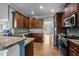 Gourmet kitchen with stainless steel appliances, granite countertops and custom wood cabinetry at 281 Derwin Dr, Timberlake, NC 27583