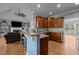 Open kitchen features granite countertops, stainless steel appliances and opens into living area at 281 Derwin Dr, Timberlake, NC 27583