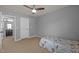 Bedroom with entrance to en suite bathroom at 302 Kinney Glenn Ct, Durham, NC 27713