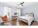 Inviting bedroom with wood floors, neutral walls, and bright natural light at 311 Pate St, Apex, NC 27502