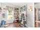 Functional home office featuring natural light and ample space for exercise equipment and storage at 311 Pate St, Apex, NC 27502