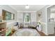Bright playroom with charming decor, natural light, and stylish accents creating an inviting space at 311 Pate St, Apex, NC 27502