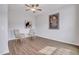 Comfortable living space with ceiling fan, wood floors, and neutral decor at 316 Alice Trace Place, Angier, NC 27501
