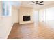 Finished basement with fireplace, vinyl flooring and bright lighting at 3204 Manor Ridge Dr, Raleigh, NC 27603