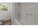 Bathroom featuring a shower and tub combo with modern fixtures at 3204 Manor Ridge Dr, Raleigh, NC 27603