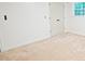Bright bedroom with plush carpeting and a closet at 3204 Manor Ridge Dr, Raleigh, NC 27603