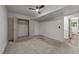 Bedroom with carpeted floor, neutral decor, and ample closet space at 3204 Manor Ridge Dr, Raleigh, NC 27603
