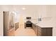 Spacious kitchen with stainless steel appliances, and crisp white cabinetry at 3204 Manor Ridge Dr, Raleigh, NC 27603