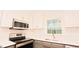 Kitchen with stainless steel appliances, white subway tile, and quartz countertops at 3204 Manor Ridge Dr, Raleigh, NC 27603