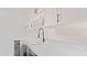 Kitchen features granite countertops, black hardware and white cabinetry at 3204 Manor Ridge Dr, Raleigh, NC 27603