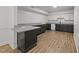 Basement kitchenette with granite countertops and modern cabinetry at 3204 Manor Ridge Dr, Raleigh, NC 27603
