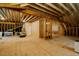 Unfinished attic space showcasing wood framing, exposed beams, and potential for future build-out at 328 Boone St, Chapel Hill, NC 27516