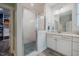 Bright bathroom featuring white subway tile in shower with blue pebble flooring at 328 Boone St, Chapel Hill, NC 27516