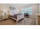 Serene bedroom with natural light, featuring a comfortable bed, stylish nightstands, and a peaceful ambiance at 328 Boone St, Chapel Hill, NC 27516