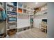 Spacious closet with built-in shelving, seating, and a desk at 328 Boone St, Chapel Hill, NC 27516