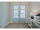 Inviting foyer featuring light blue double doors and a decorative table at 328 Boone St, Chapel Hill, NC 27516