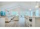 Bright, open living space with high ceilings, white walls, and ample seating, perfect for relaxation and entertaining at 328 Boone St, Chapel Hill, NC 27516