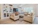 Comfortable living room featuring built-in shelving, neutral tones, and cozy seating, creating a relaxing atmosphere at 328 Boone St, Chapel Hill, NC 27516