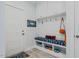 Well-organized mudroom entrance with cubbies, bench seating, hooks and storage for shoes and accessories at 328 Boone St, Chapel Hill, NC 27516