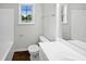 Well-lit bathroom with a vanity, toilet, tub and shower featuring neutral colors and a clean design at 3708 Mackinac Island Ln, Raleigh, NC 27610