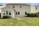 Fenced backyard, ready for outdoor enjoyment with patio space and shade trees at 3709 Althorp Dr, Raleigh, NC 27616