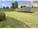 A spacious backyard with solar panels and a wood fence offers sustainable living and privacy at 3709 Althorp Dr, Raleigh, NC 27616