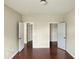 Bedroom features neutral walls and two closets for plenty of storage space at 3709 Althorp Dr, Raleigh, NC 27616