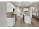 Well-equipped kitchen with modern appliances, granite countertops, and ample cabinet space for storage at 3709 Althorp Dr, Raleigh, NC 27616