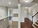 Bright, open kitchen with modern appliances, a breakfast bar, and seamless connection to the living areas at 3709 Althorp Dr, Raleigh, NC 27616