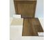 Sample of home materials featuring wood floors, cabinet door, counter top and backsplash at 372 Chesapeak Commons St # 131, Garner, NC 27529