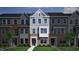Charming two-story townhome with brick and gray siding, nestled in a landscaped community at 376 Chesapeak Commons St # 130, Garner, NC 27529