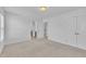 Bedroom featuring neutral carpet and a view into the bathroom at 384 Grey Hawk Dr, Garner, NC 27529