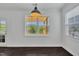 Breakfast nook with large windows that offer scenic views of the outdoors at 384 Grey Hawk Dr, Garner, NC 27529