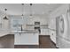Gourmet kitchen with stainless steel appliances, granite countertops, and a central island at 384 Grey Hawk Dr, Garner, NC 27529