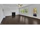 Bright living room showing open space and fireplace at 384 Grey Hawk Dr, Garner, NC 27529