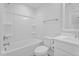 Bathroom with a bathtub-shower combo, and a modern vanity with a bright neutral palette at 412 Kavanaugh Rd, Wake Forest, NC 27587