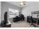 This bedroom features neutral carpet, ceiling fan and good natural light from the window at 412 Kavanaugh Rd, Wake Forest, NC 27587