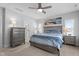 Bedroom with a ceiling fan, a double dresser, and a view to the en-suite bathroom at 412 Kavanaugh Rd, Wake Forest, NC 27587