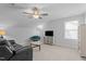 Bonus room with plush carpet and ceiling fan, perfect for entertaining and relaxing at 412 Kavanaugh Rd, Wake Forest, NC 27587