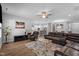 Spacious living room area showcasing recessed lighting, an open floor plan, and wood floors at 412 Kavanaugh Rd, Wake Forest, NC 27587