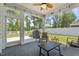 Covered patio with fan and outdoor seating area with great backyard views at 412 Kavanaugh Rd, Wake Forest, NC 27587
