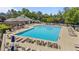 Resort-style pool with lounge chairs and shaded pergola for relaxation and leisure at 412 Kavanaugh Rd, Wake Forest, NC 27587