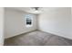 Neutral bedroom with carpet, white walls, and a bright window at 4169 Weavers Pond Dr, Zebulon, NC 27597
