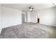 Bright, carpeted bonus room with multiple doorways and ample natural light at 4169 Weavers Pond Dr, Zebulon, NC 27597