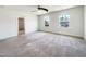 Spacious room features carpeted floor with natural light and large windows for neighborhood views at 4169 Weavers Pond Dr, Zebulon, NC 27597