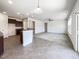 Spacious living room features tile flooring, an open floor plan, and lots of natural light at 4169 Weavers Pond Dr, Zebulon, NC 27597