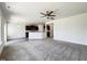 Bright living room features recessed lighting, a ceiling fan, and an open floor plan at 4169 Weavers Pond Dr, Zebulon, NC 27597