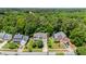 Aerial view of a landscaped residential home in a suburban neighborhood at 4608 Regency Dr, Durham, NC 27713