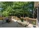 A spacious back deck with outdoor seating, perfect for entertaining at 4608 Regency Dr, Durham, NC 27713
