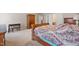 View of a bedroom with carpet, neutral walls, and dark wood furnishings at 4608 Regency Dr, Durham, NC 27713